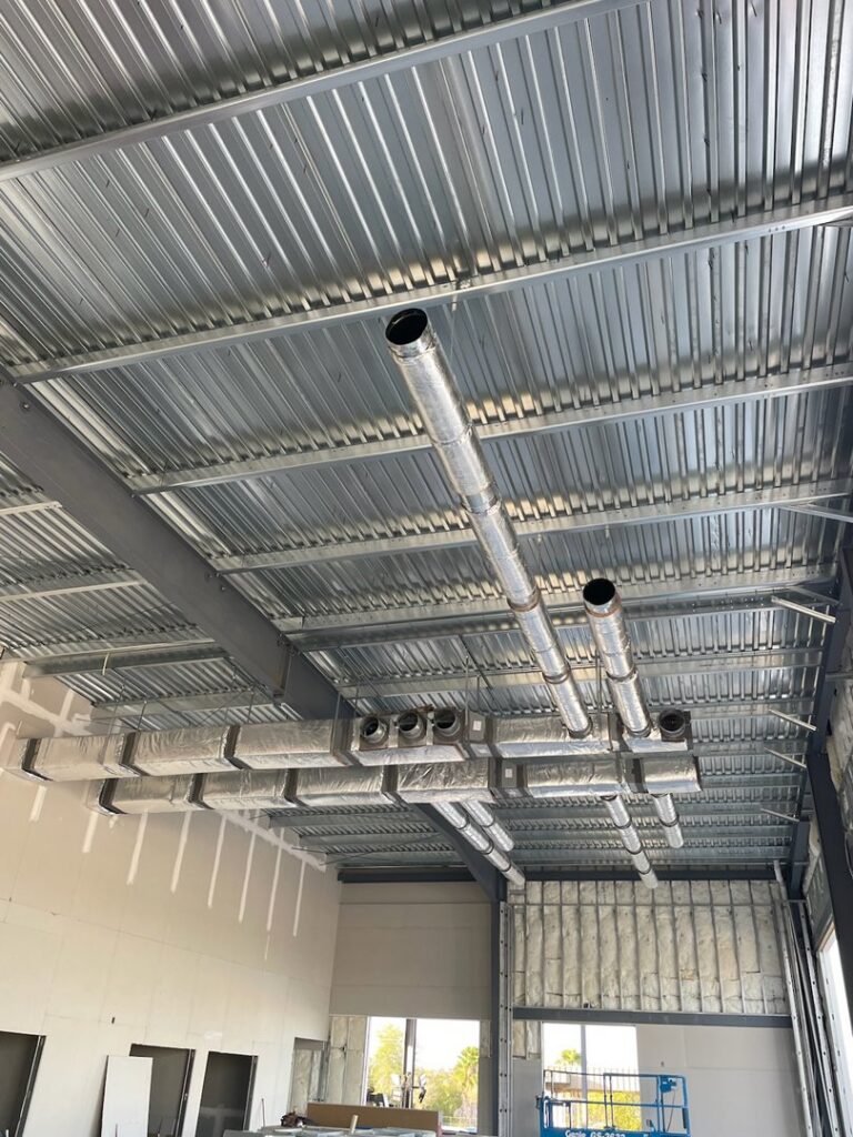 Newly installed HVAC ductwork in a commercial building by Norway Air Conditioning Inc. in Laredo, TX.
