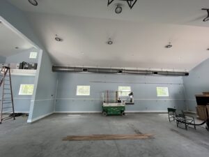 Newly installed exposed HVAC ductwork in a large commercial or residential space by Whitleys Heating and Air in Jacksonville, FL.