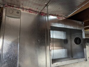 HVAC ductwork installation with a humidifier control panel by Central Heating & Air Conditioning in Billings, MT