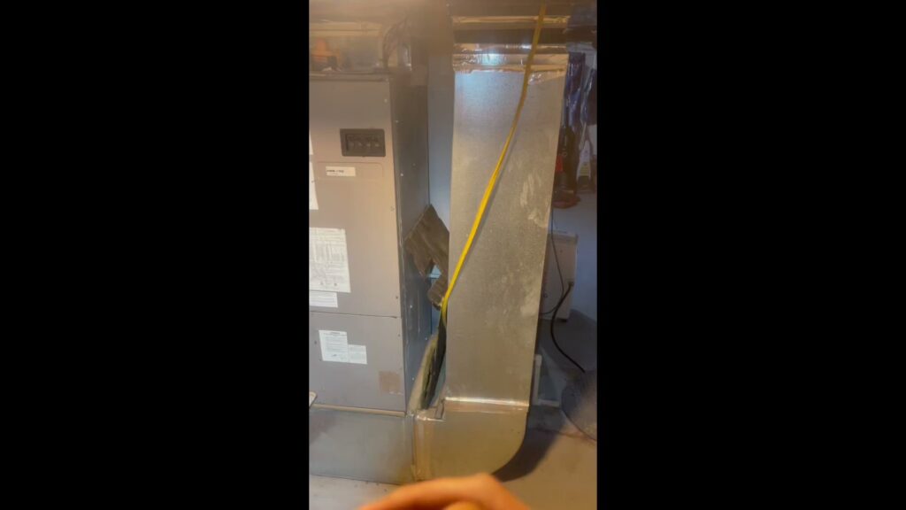 HVAC ductwork and indoor unit being measured for installation by GT Mechanical Services in Baltimore, MD