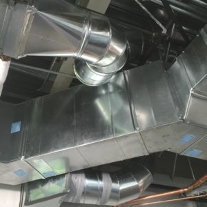 Newly installed metal HVAC ductwork in a commercial building by Mechanical Design & Service in Ogden, UT
