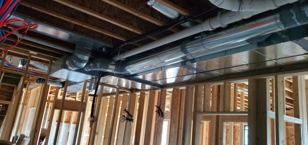 Extensive HVAC ductwork installed in the ceiling of a new construction home by 406 Heating & Cooling LLC in Missoula, MT.