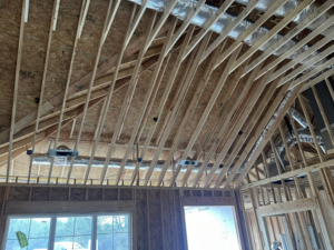 HVAC ductwork being installed in the ceiling of a new construction home by HBC in Cranston, RI.