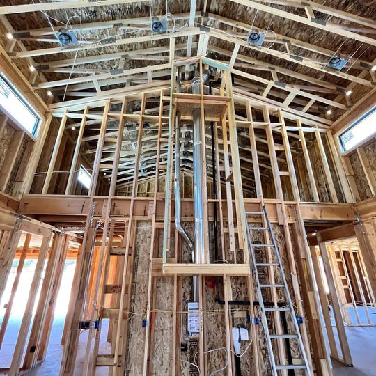 HVAC ductwork being installed within the framing of a new home construction project by TK Heating and Air, PLLC in Queen Creek, AZ