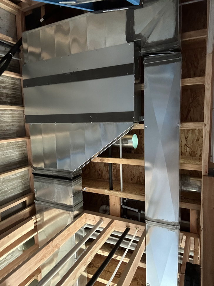 New metal HVAC ductwork installation in a residential or commercial building by R&R Mechanical Services in Greeley, CO.