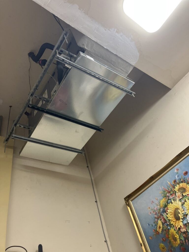 HVAC ductwork and air handler installation in a ceiling by Southwest Florida Air Quality in Cape Coral, FL