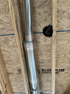 HVAC ductwork and piping being installed within wall studs by Steve's Heating & Cooling in Florence, KY.