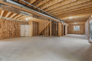 HVAC ductwork installed in the ceiling of an unfinished basement by LUCAS Heating And Air LLC in Salt Lake City, UT.