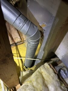 HVAC ductwork and insulation in an attic space installed by Breezy Heating and Cooling in Mobile, AL.