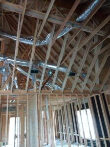 Extensive HVAC ductwork installation in the attic of a new construction project by Dowd Heat & Air in Tulsa, OK.