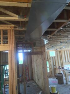 HVAC ductwork being installed in a new construction home by Michael Savage-Lanz Heating & Cooling in Champaign, IL