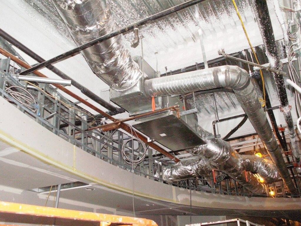 HVAC ductwork and piping installed in a commercial building under construction by 1st Team Air Conditioning, Inc. in Anaheim, CA.