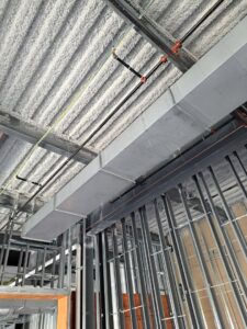 Rectangular HVAC ductwork and sprinkler system installation in a commercial ceiling by Central Consolidated in Wichita, KS