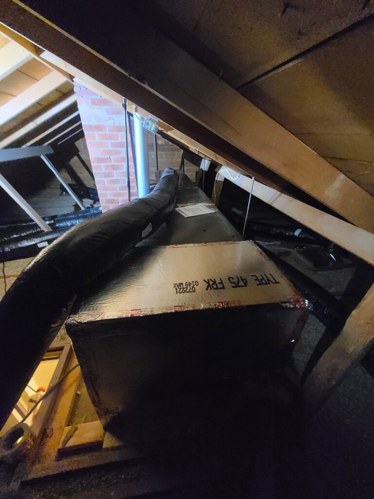 An HVAC ductwork system installed in an attic space by Rural Heating and Cooling Systems in Roundup, MT.
