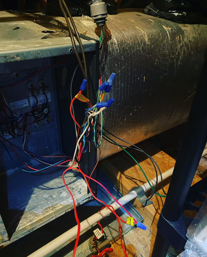 Detailed electrical wiring connections inside an HVAC unit by B & H Heating and Air Services LLC in Local City, ST.