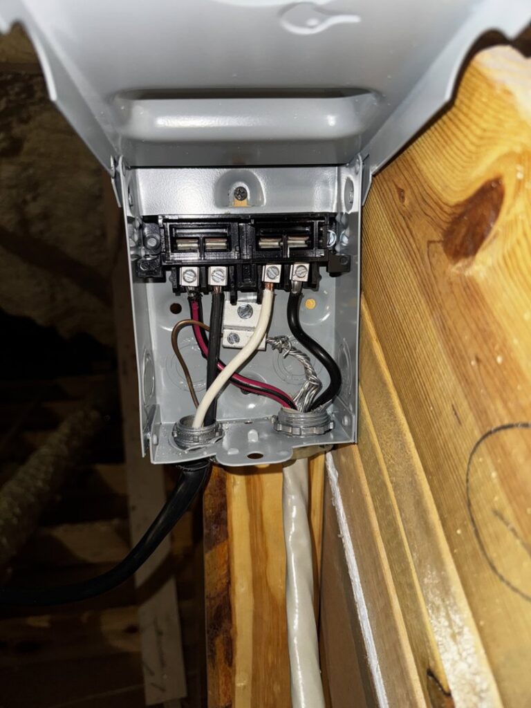 Electrical wiring inside a junction box, part of an HVAC system installation by OnPoint Heating and Air in Commerce City, CO.
