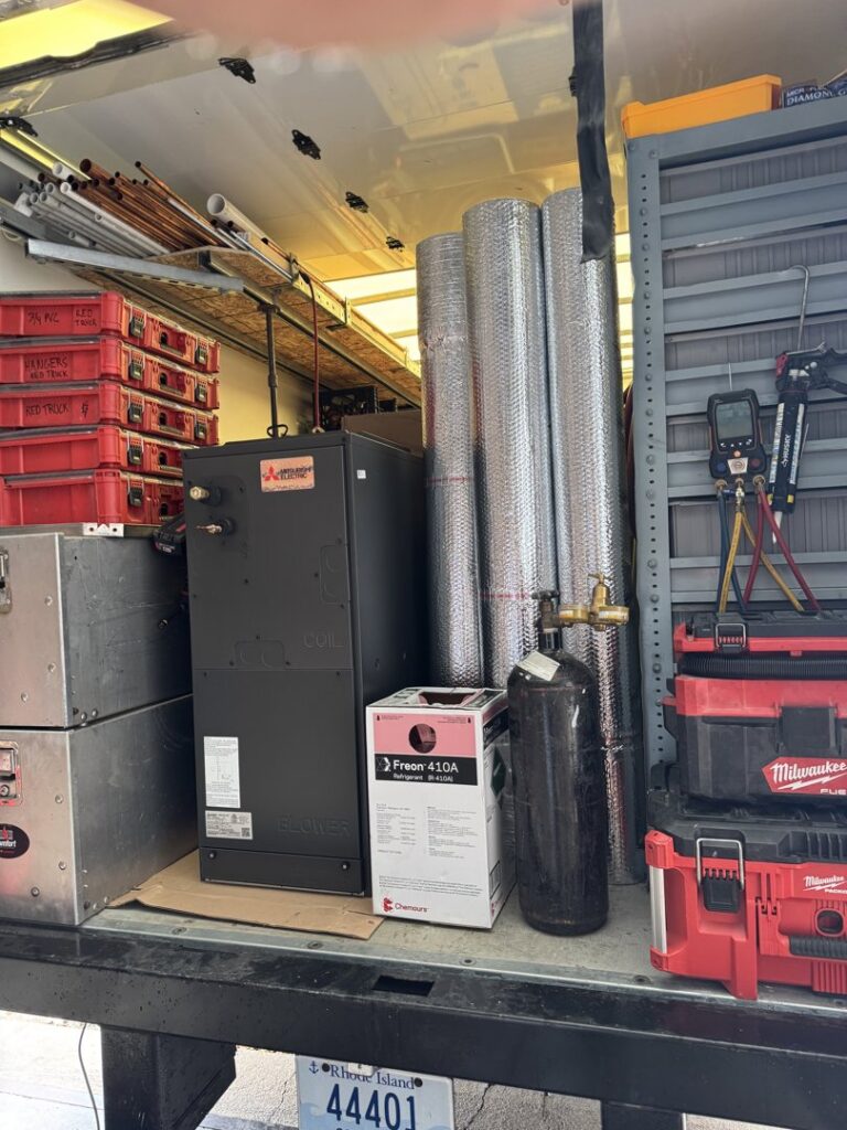 HVAC equipment and tools organized inside a work van for Comfort Systems and Solutions in Coventry, RI