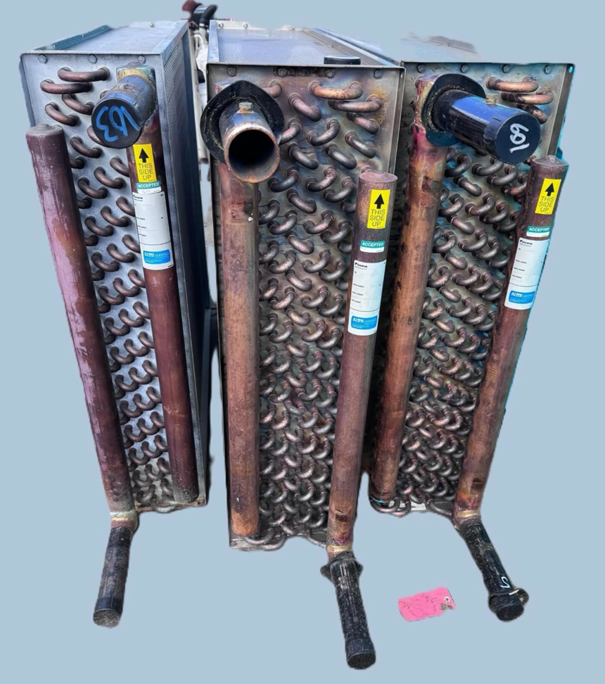 Multiple HVAC evaporator coils ready for installation or sale at SURPLUS AC INC. in Doral, FL