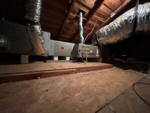 An HVAC furnace and air handler unit with ductwork installed in an attic by Competition A/C & Heat, LLC in Corpus Christi, TX