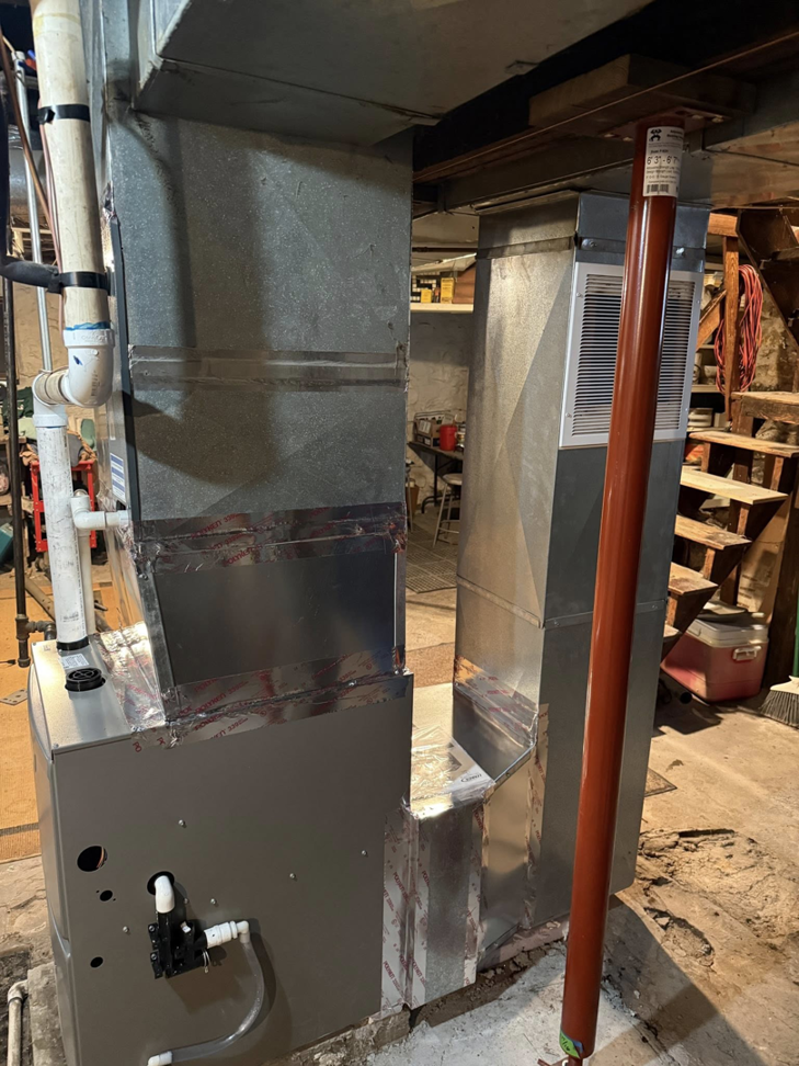 An HVAC furnace and extensive ductwork system installed by Comfort Home Services in Sugar Creek, MO