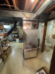 An HVAC furnace and ductwork system installed in a basement by HVAC KING LLC in Maple Grove, MN