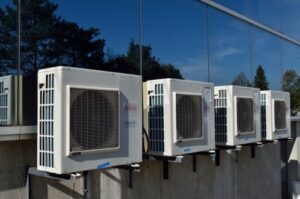 An HVAC furnace and a Navien boiler system installed side-by-side by Dane HVAC in Willowbrook, IL.
