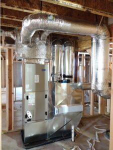 New Carrier HVAC furnace and ductwork installation in a residential building by Ambiaire in Lakewood, NJ