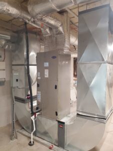 HVAC furnace and extensive ductwork installation in a utility room by Ambiaire in Lakewood, NJ