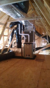 An HVAC furnace and ductwork installation in an attic by Legendary Mechanical LLC in Toms River, NJ.