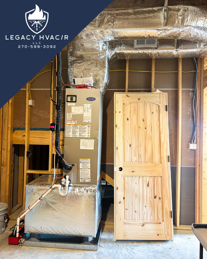 An HVAC furnace and air handler unit installed in a partially finished basement by Legacy Hvac/r in Libertyville, IL.