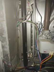 Close-up of HVAC furnace interior wiring and components serviced by Higher Peak Air Conditioning and Heat, LLC 1 in Houston, TX