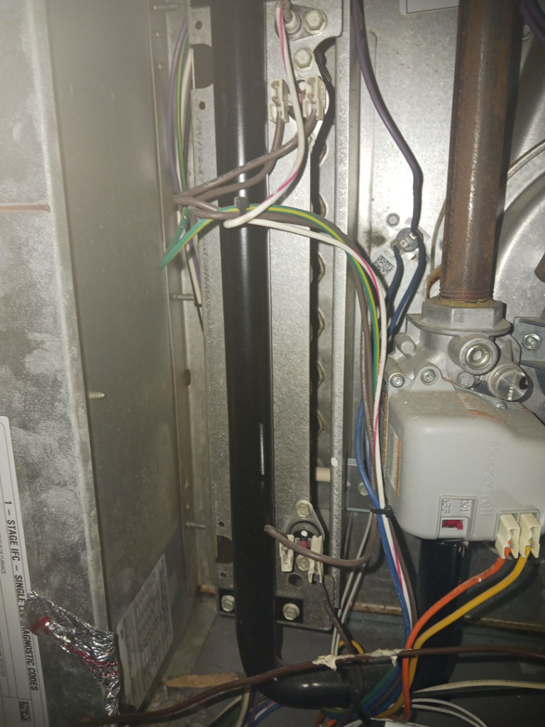 Close-up of HVAC furnace interior wiring and components serviced by Higher Peak Air Conditioning and Heat, LLC 1 in Houston, TX