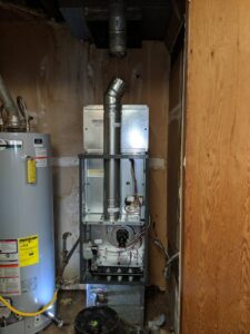 Internal components of an HVAC furnace unit being serviced by Goodpaster's Mechanical, Inc. in Broken Arrow, OK.