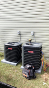 Installation of two Goodman outdoor AC units by Turner & Son's Heating and Air in Anderson, IN