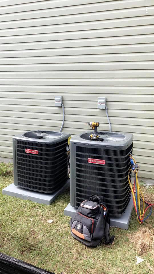 Installation of two Goodman outdoor AC units by Turner & Son's Heating and Air in Anderson, IN