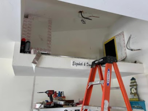 An HVAC installation in progress with exposed ductwork and tools at Southwest Florida Air Quality in Cape Coral, FL