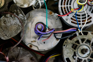 Various HVAC motors and components, suggesting repair or replacement services by AirTemp Heating & Cooling in Nashville, TN.