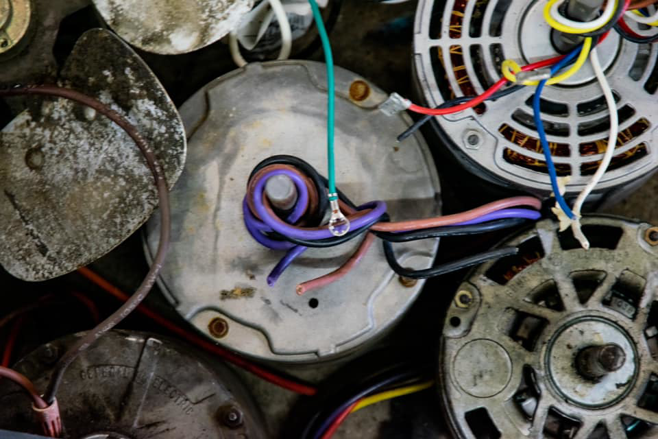 Various HVAC motors and components, suggesting repair or replacement services by AirTemp Heating & Cooling in Nashville, TN.