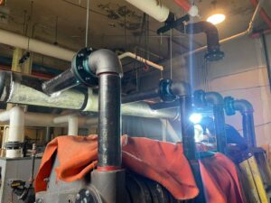 HVAC piping installation in progress by Detroit Metro Mechanical, Inc. in Harrison Township, MI.