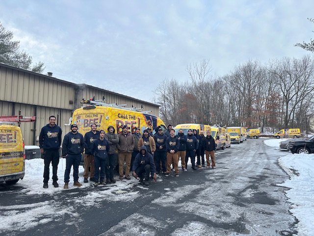 The Call The Bee Plumbing, Heating, Air & Electric team and service vans in Farmington, CT, ready for jobs.
