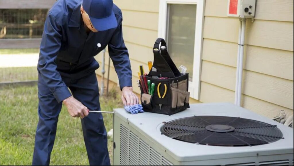HVAC repair tools like pliers and a wrench on an outdoor AC unit during service by Taylor & Tyler HVAC, New Orleans, LA.