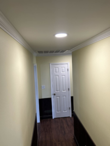 A newly installed HVAC return air vent in a hallway by S&S A/C and Electrical LLC in Houma, LA.