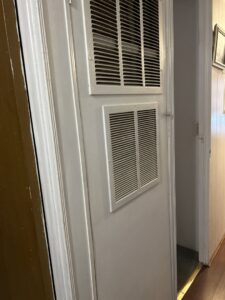 Two white return air vents for an HVAC system, installed by Sullivan Heating & Cooling in Depew, NY