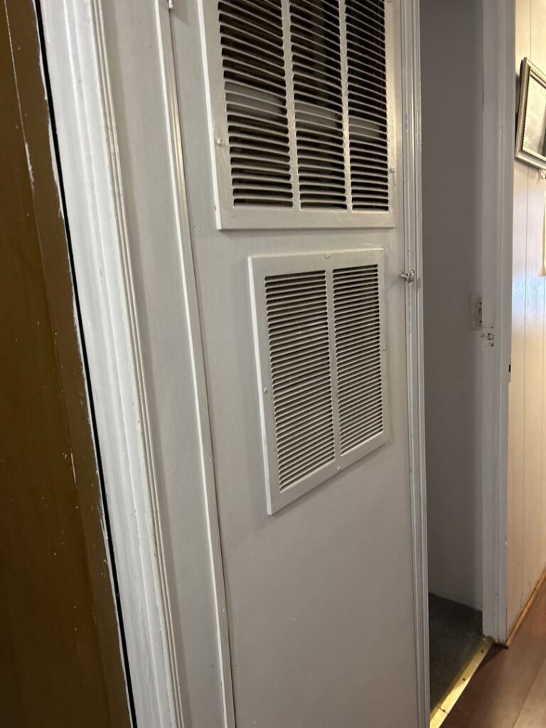 Two white return air vents for an HVAC system, installed by Sullivan Heating & Cooling in Depew, NY