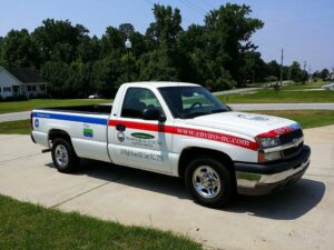A branded service pickup truck for Environmental Heating & Air NC, ready for jobs in Cary, NC.