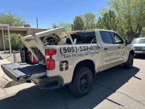 A Desert Sage Heating and Cooling service truck transporting HVAC equipment in Albuquerque, NM.