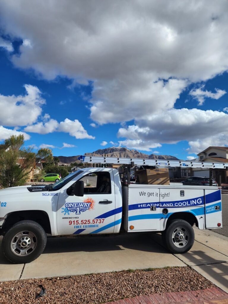 A One Way Heating And Cooling, LLC service truck with ladders and equipment ready for a job in Horizon City, TX.