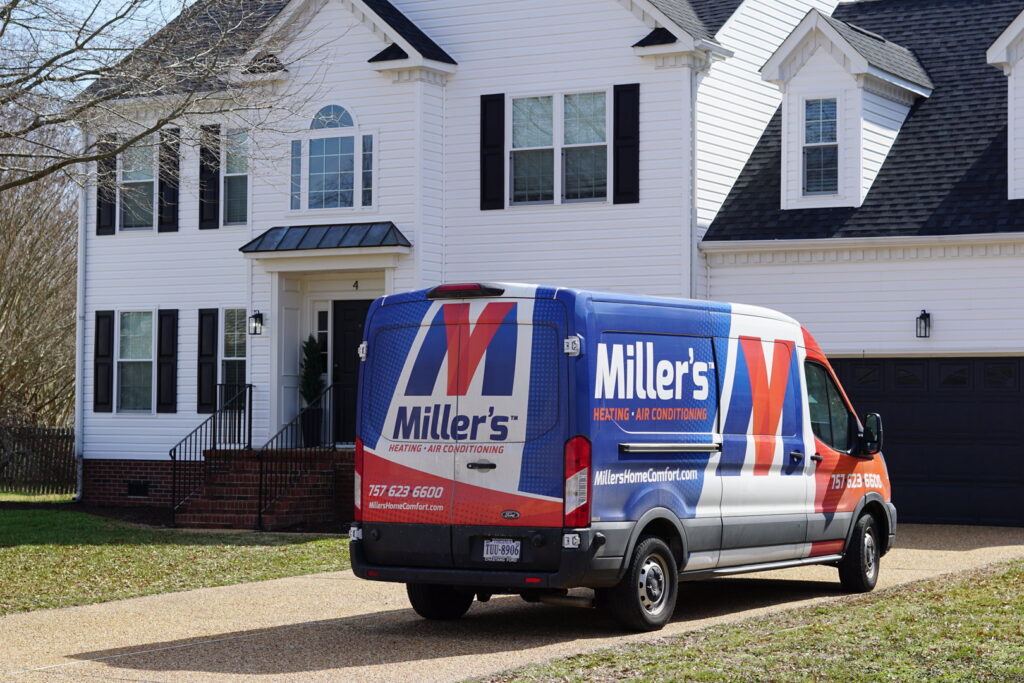 A Miller's Home Comfort-Chesapeake service van parked at a residential home in Chesapeake, VA.