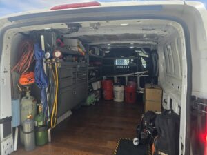 The organized interior of an HVAC service van with tools and equipment for Az AC and Heat Services in Queen Creek, AZ.