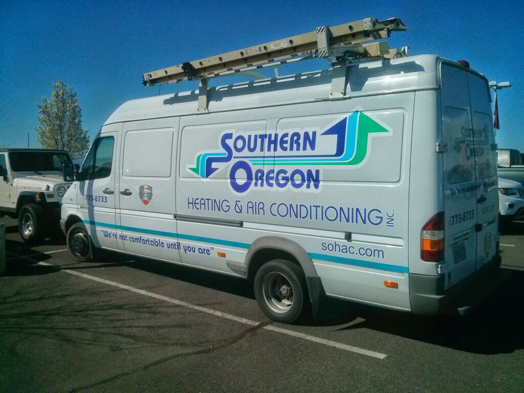 A branded HVAC service van from Southern Oregon Heating & Air Conditioning in Medford, OR
